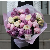 Bouquet of peonies and lilacs